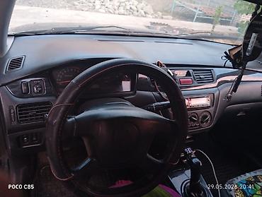 surron light bee: Mitsubishi Lancer: 2004 г., 1.6 л, Механика, Бензин, Универсал — 9