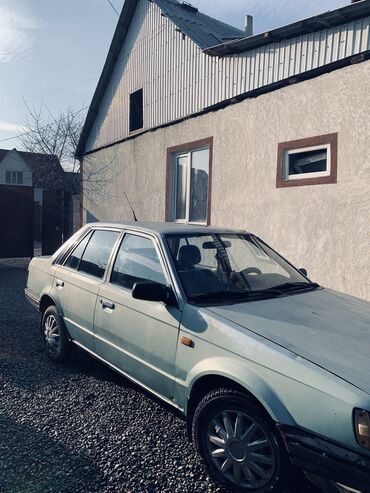 продажа камаз: Mazda 323: 1987 г., 1.5 л, Механика, Бензин, Седан