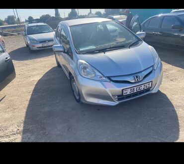 Honda: Honda Fit: 2012 г., 1.6 л, Вариатор, Гибрид, Хэтчбэк