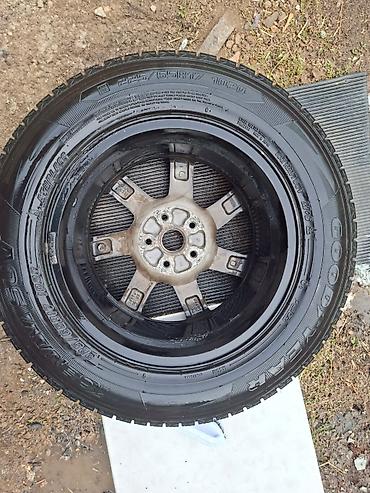 Шины и диски: Комплект зимних колес для кроссоверов/SUV. Состав: - Шины Goodyear — 8