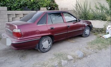 матис 2003: Продается седан Daewoo Nexia бордового цвета. Автомобиль имеет