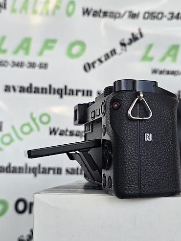 mini dv kamera: Sony Alpha a6000 aynasız fotoaparat + FE 28–70mm f/3.5–5.6 OSS — 2