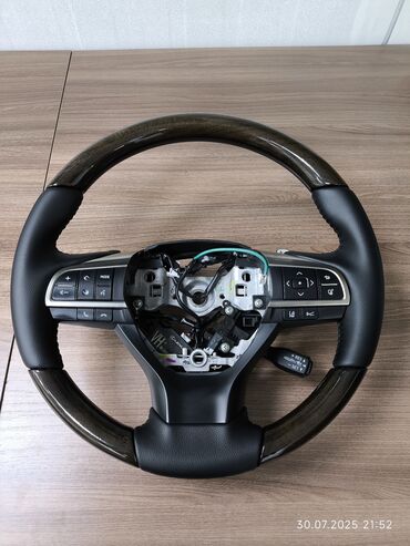 Работы по обшивке: Перетяжка рулей натуральной кожей и ЭКО кожа - Профессиональная — 5