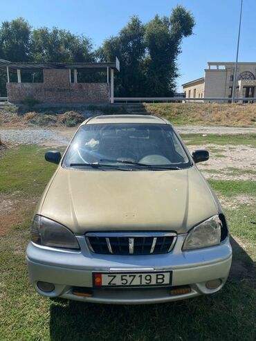 машинный холодильник: Kia Carens: 2000 г., 1.5 л, Автомат, Газ, Минивэн