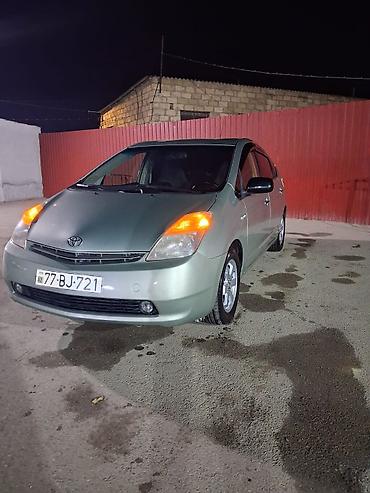авто базар: Toyota Prius (2-ci nəsil) hibrid hetçbek - Hibrid benzin-elektrik güc — 1