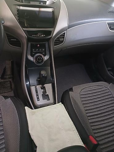фольксваген пассат 1: Hyundai Elantra: 1.8 л | 2013 г. Седан — 7