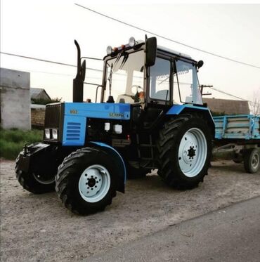 yükləyici traktor: Трактор
