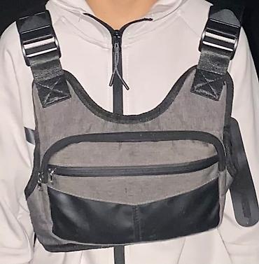 протирка: Нагрудная сумка (chest bag) серо‑черного цвета. - Конструкция — 1