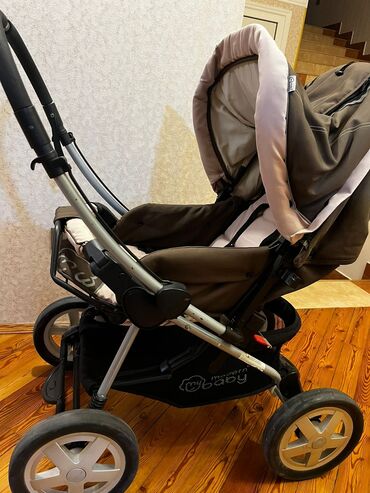 Az işlənmiş Modern Baby brendinin uşaq arabası. Bu araba uşağınızın