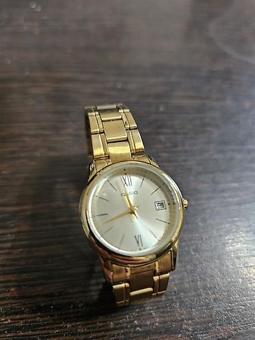 Casio qol saatı – klassik qızılı dizayn - Korpus və qolbaq: metal