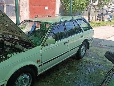 spark 2010: Nissan Bluebird: 1990 г., 2 л, Механика, Бензин — 3