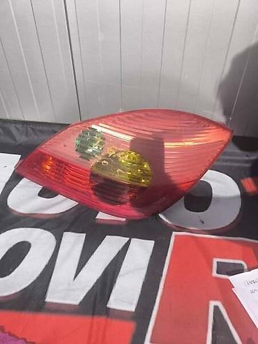 Auto-delovi: DESNO STOP SVETLO ZA OPEL TIGRA OD 2004. DO 2009. GOD. | Molba za — 1