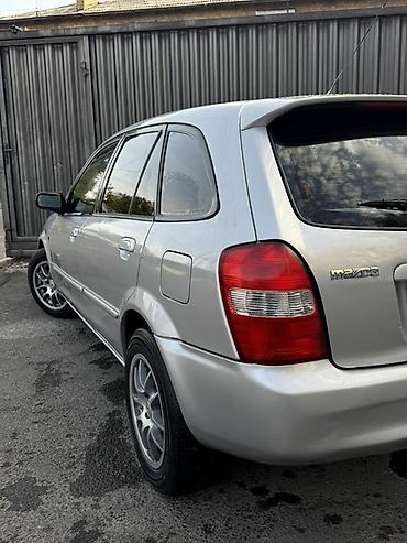 rexton j4: Mazda Familia: 2002 г., 1.6 л, Механика, Бензин, Хэтчбэк — 5