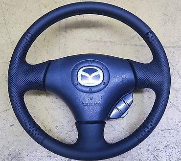 голыф 2: Продается руль с подушкой от Mazda. Подходит на модели: 323, 626 — 1