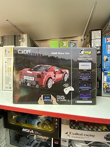 красный страитель: Конструктор CaDA 488 Race Car, модель C51072W. Набор для сборки — 2