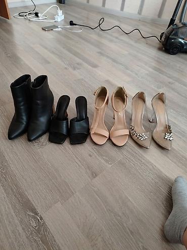 devit 3: Ayaqqabılar 7 manatdan sumkalar 3 manatdan cins şalvarlar 8 manatdan — 1