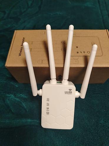 kabelsiz modem: Dual-Band Wi‑Fi Gücləndirici / Repeater Xüsusiyyətlər: - 2.4 GHz və 5 — 1
