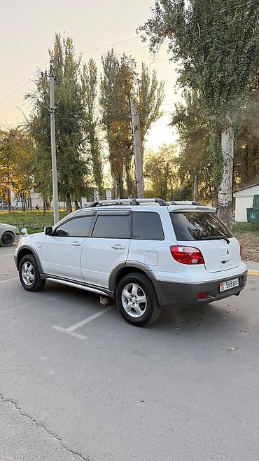 lancer 9: Mitsubishi Outlander: 2004 г., 2.4 л, Автомат, Газ, Кроссовер — 10