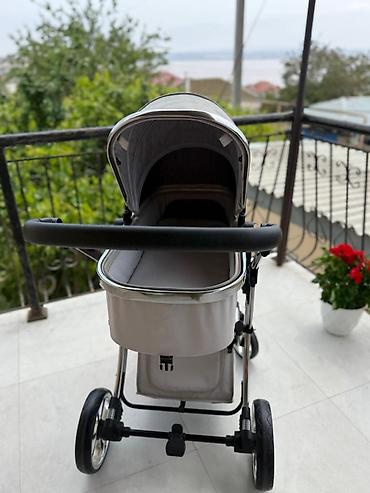 Modullu arabalar: Kidilo brendinin G10 modeli beşik tipli uşaq arabası. Bu araba — 6