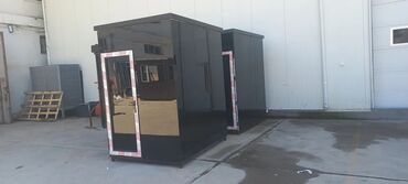 киоск: Qara rəngdə olan, qapısı olan müasir dizaynlı iki ədəd modul kabin. Bu