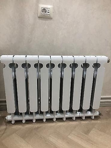 radyator: 4 ədəd 12 kiloluq radiatorlar. təzə paketin icindedirler. şəkildəki — 2