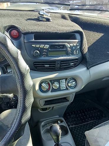11 00r20: Nissan Almera Tino: 2001 г., 1.8 л, Механика, Купе — 5