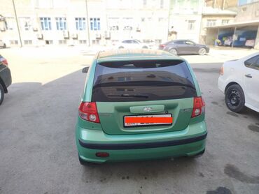 красные машины: Hyundai Getz: 2004 г., Хетчбек