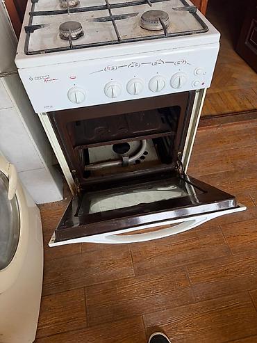 mikrodalqalı soba: Gefest 3100-06 qaz plitəsi və qaz sobası - 4 qaz ocağı: 1 böyük, 2 — 3