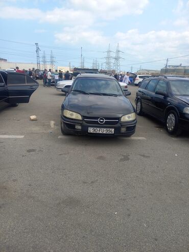 Avtomobil alışı: Opel Omega Caravan (universa) – qara rəng, 5 qapı, dam relsləri ilə