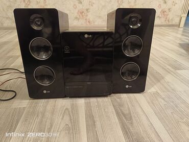 bluetooth qulaqciq qiyməti: İki dinamik və mərkəzi blokdan ibarət LG mini Hi-Fi sistemi. Real