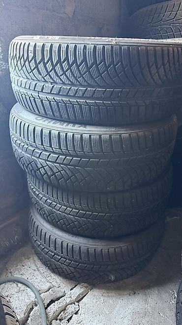 сто рядом со мной: Комплект зимних шин Kumho - Размер: 215/55 R17 - Индекс — 1