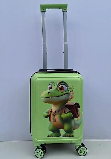 Rančevi, torbe i koferi: Dečji kofer na točkiće – zeleni, sa motivom simpatičnog dinosaurusa - — 1