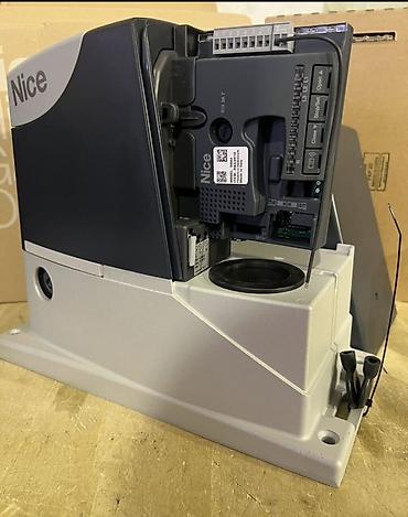 Откатные ворота: Моторчик для автоматизации откатных ворот массой до 1 000кг. Двигатель — 7