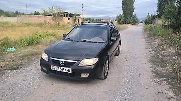 mazda cx: Mazda 323: 2003 г., 1.6 л, Механика, Бензин, Хэтчбэк — 1