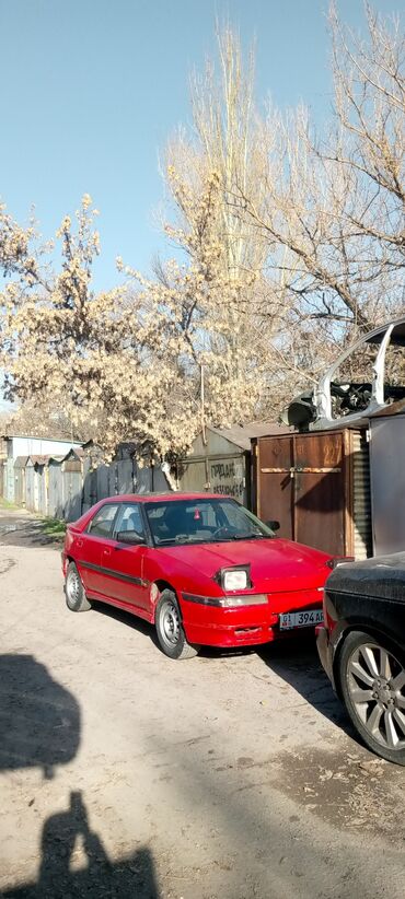 машина кеж: Mazda 323: 1989 г., 1.8 л, Механика, Бензин, Хэтчбэк