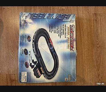 Детские электрокары: Elektrik Slot Yarış Seti – “High-Speed Racing” Paketin tərkibi: - 2 — 1