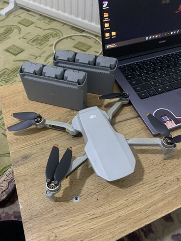 фотоаппарат для начинающих недорогой: Компактный квадрокоптер DJI Mini 2 в светло-сером корпусе. Оснащен