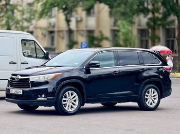 тайота хойландер: Продается черный кроссовер Toyota Highlander. Эта модель предлагает