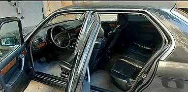mercedes e class: BMW 7 series: 3.5 l | 1991 il Sedan — 7