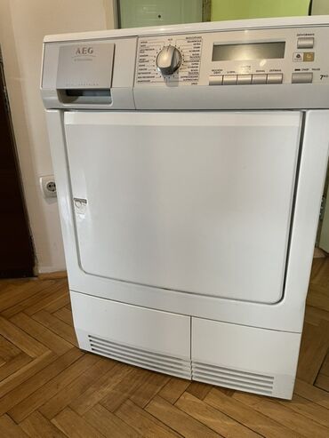novogodisnji laser za kucu: AEG mašina za sušenje veša kapaciteta 7 kg. Poseduje programator sa