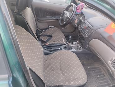 зил урал: Nissan Almera Classic: 2001 г., 1.5 л, Механика, Бензин, Хэтчбэк — 7