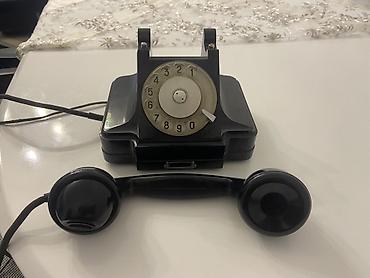 Stasionar telefonlar: Məhsul: Mexaniki diskli retro masa telefonu Təsvir: - Korpus: Qara — 2