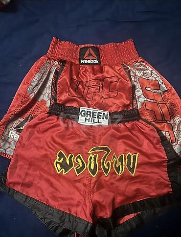 idman geyimləri: - İdman şortu dəsti - Modellər: - Reebok UFC temalı qırmızı şort — 1