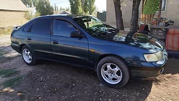 машина labo: Toyota Carina E: 1996 г., 1.6 л, Механика, Бензин, Лифтбек — 1