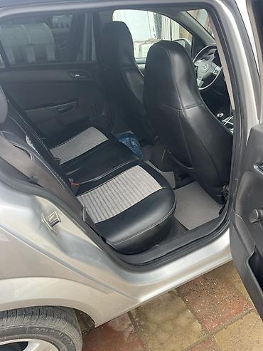 lada kalina 2008: Opel Astra Caravan (universall) – gümüşü rəng Xüsusiyyətlər: - Kuzov — 4