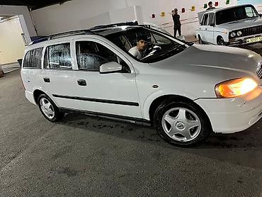 opel astra maşın: Opel Astra Caravan (ağ), universal kuzov - Geniş yük və sərnişin — 7