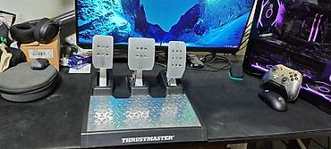 Рули: Комплект для симрейсинга Thrustmaster + аксессуары Состав: - Руль — 12