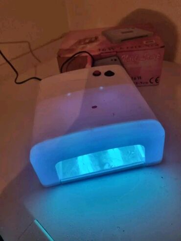 tablete za mršavljenje: UV lampa za nokte, snage 36W. Kompaktna, bele boje, sa tajmerom