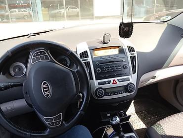kia salony: Kia cee’d hatchback - Kuzov: 5 qapılı hatchback, gümüşü rəng - Salon — 6