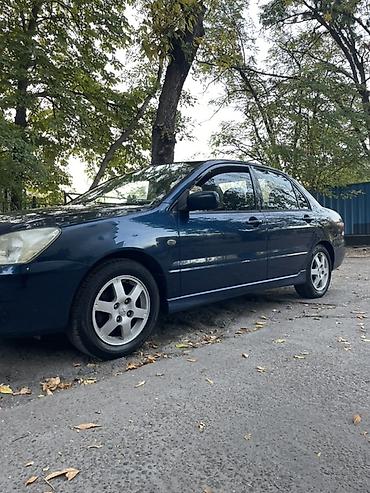 low ll: Mitsubishi Lancer: 2004 г., 1.6 л, Механика, Бензин, Седан — 3